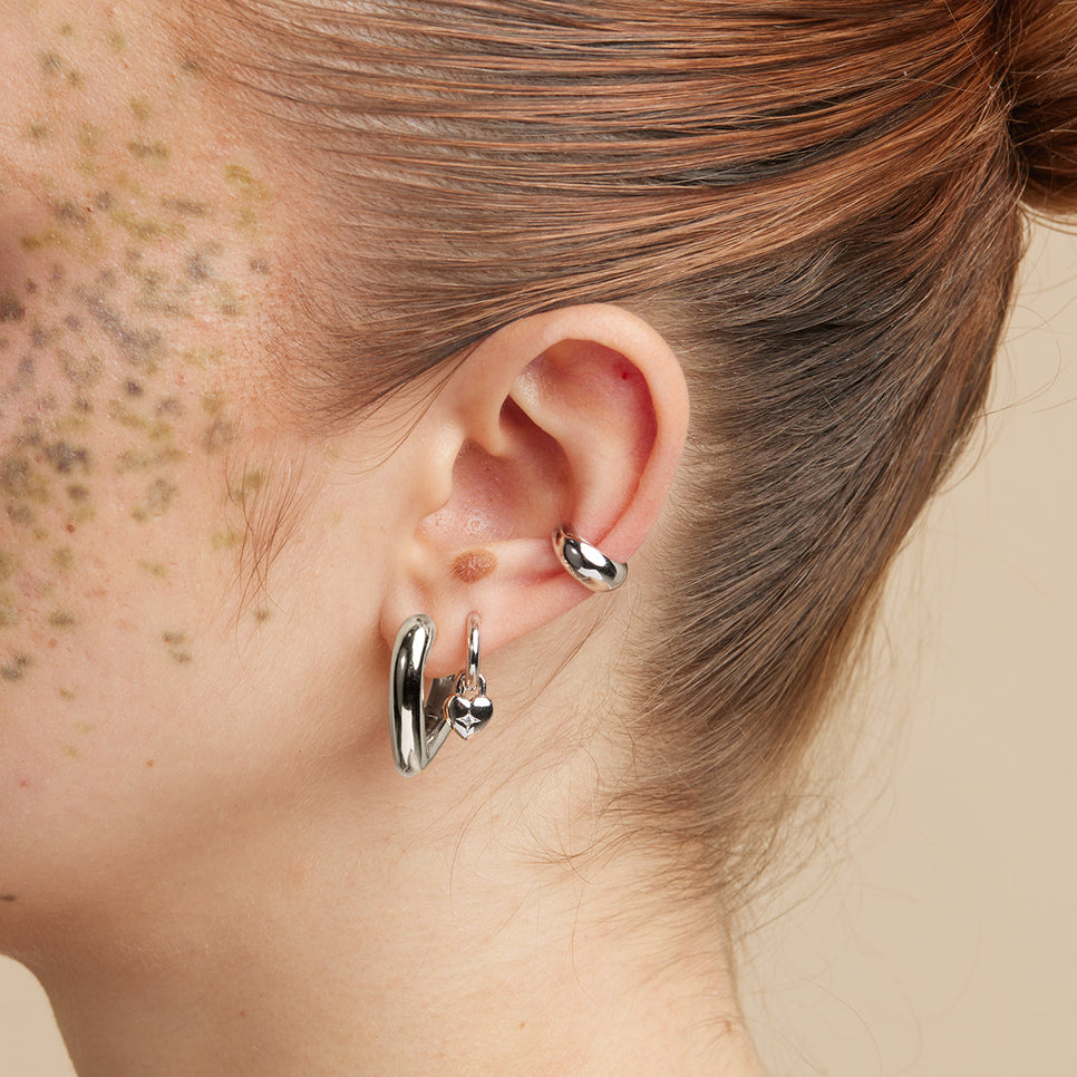 Heart Charm Huggies in Silver