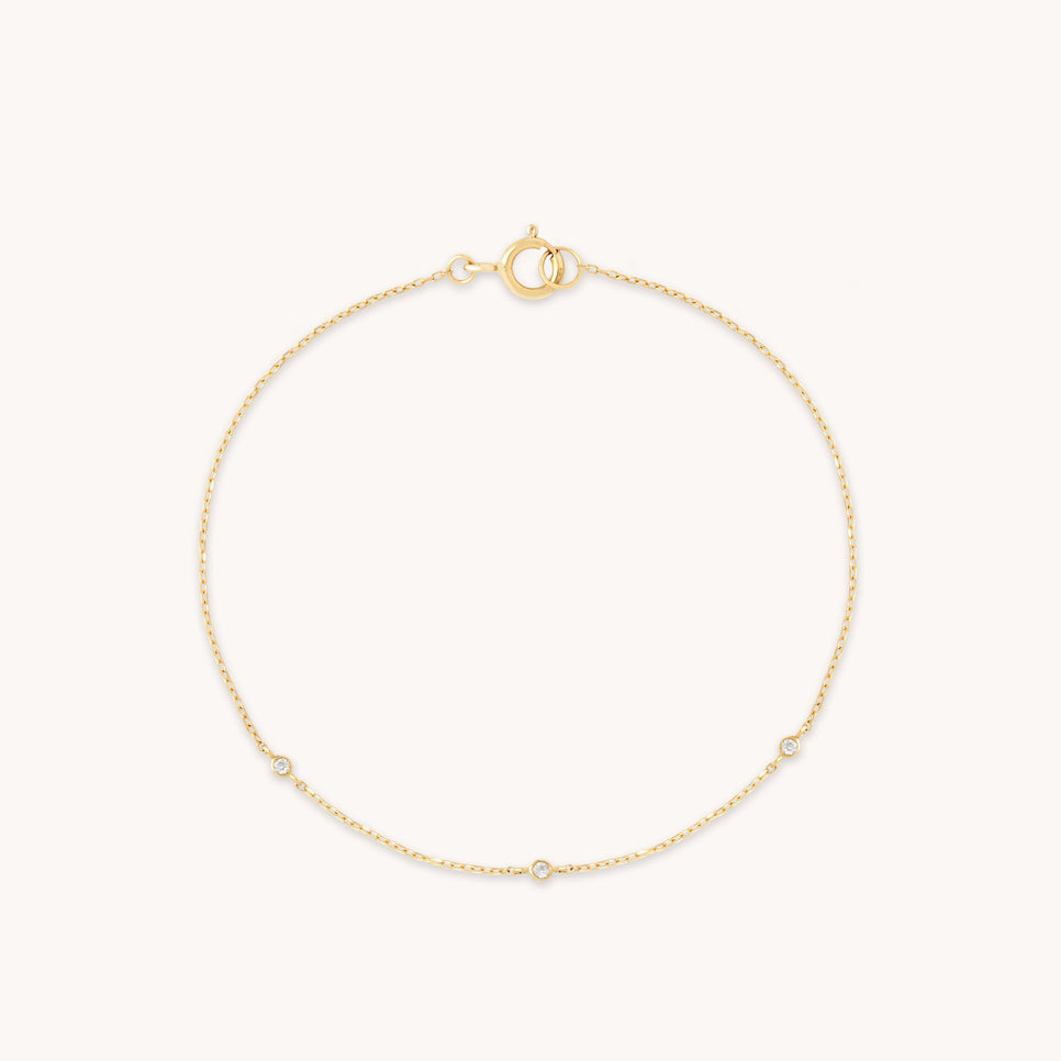 Topaz Charm Bracelet in Solid Gold