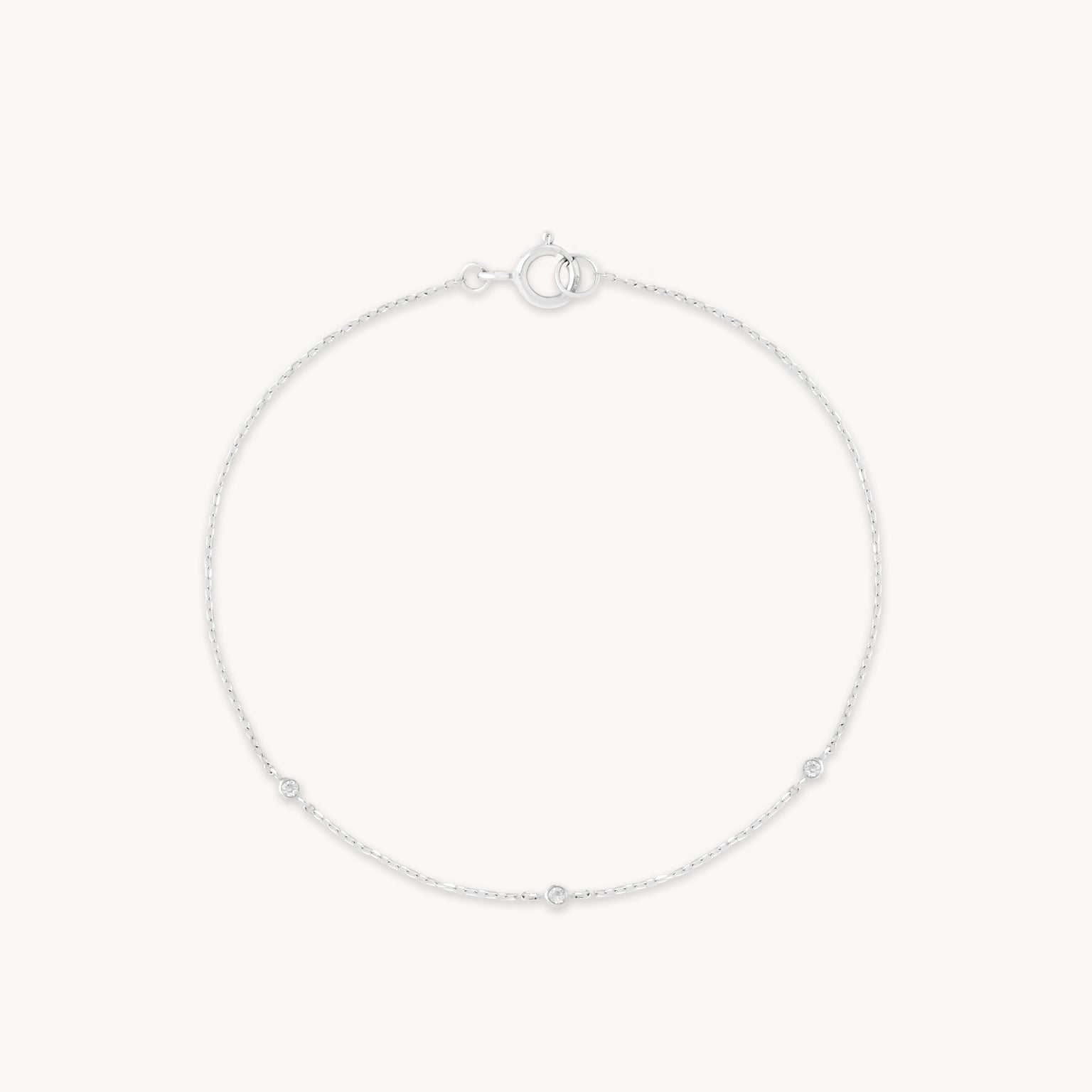 Topaz Charm Bracelet in Solid White Gold
