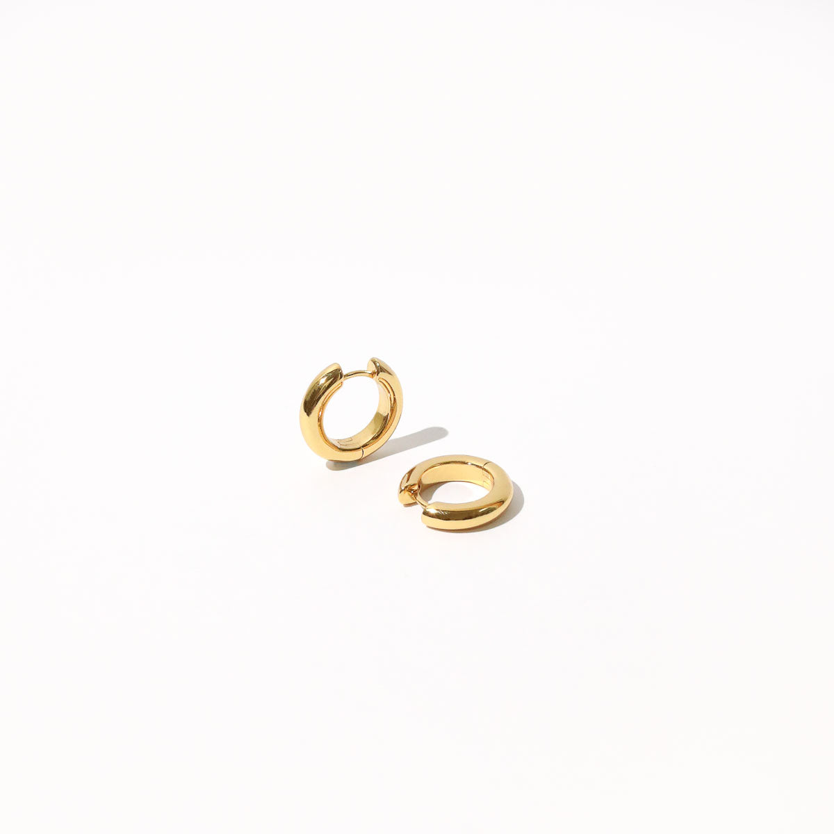 Bold Medium Hoops in Gold flat lay