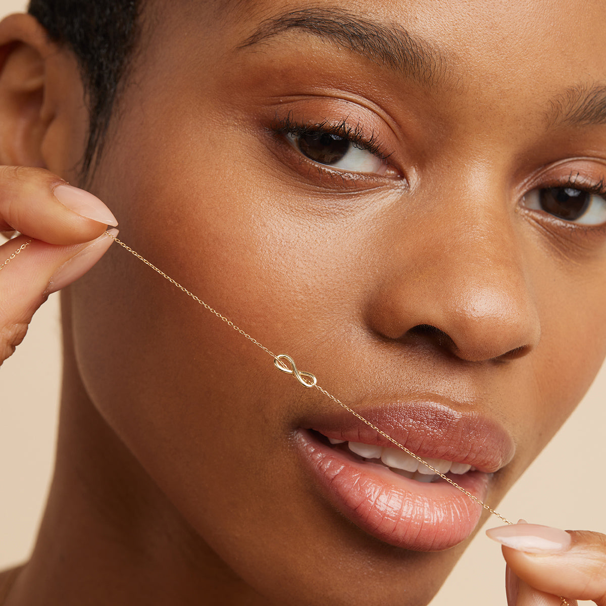 Infinite Charm Bracelet in Solid Gold