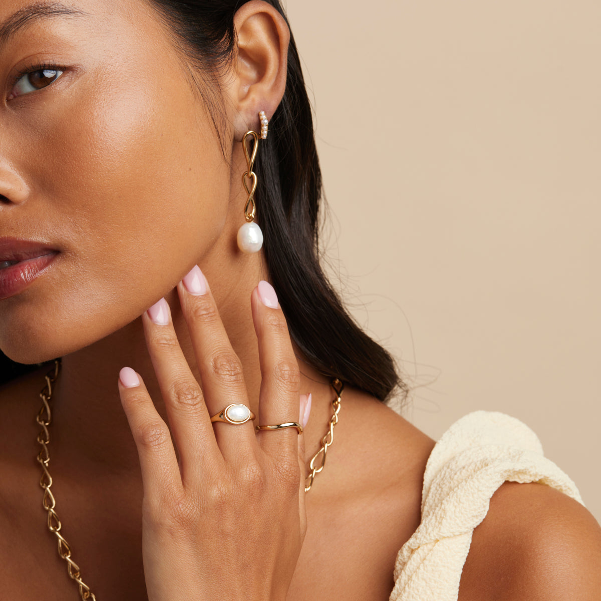 Infinite Pearl Drop Studs in Gold