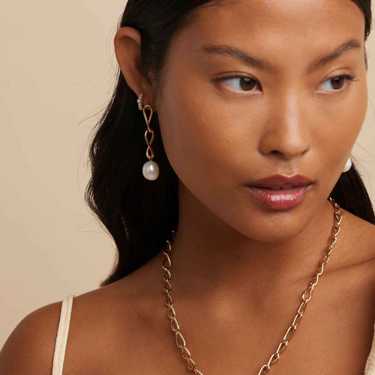 Infinite Pearl Drop Studs in Gold