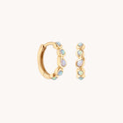 Opal Pear Bezel Huggies in Solid Gold