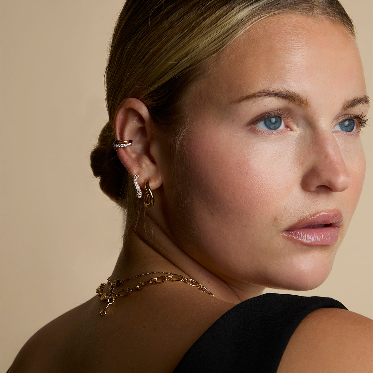 Wave Crystal Hoops in Gold-Astrid & Miyu