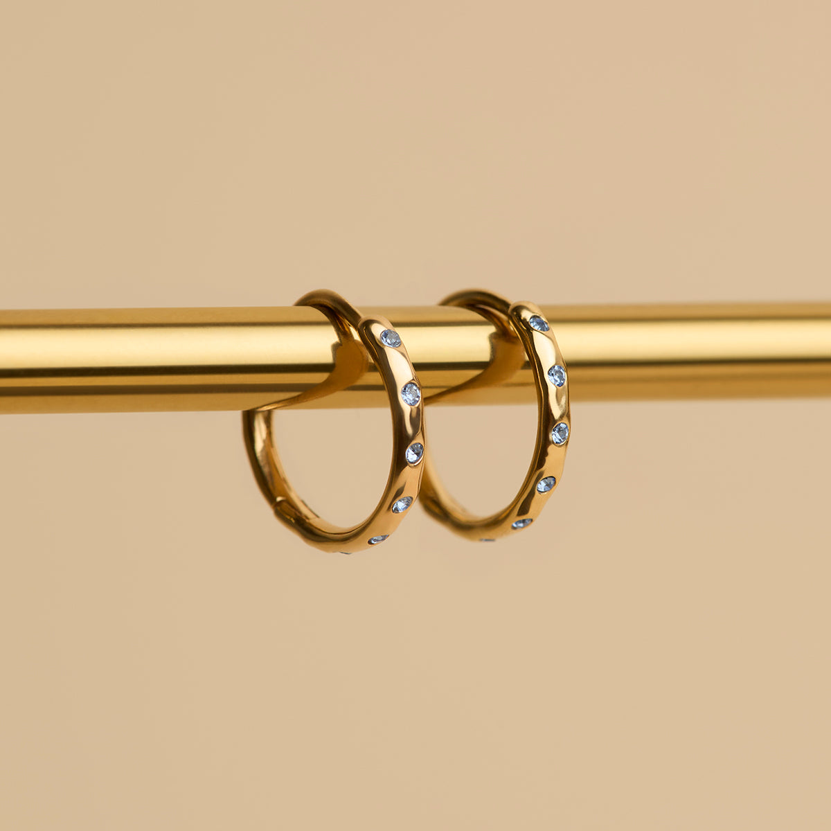 Molten Blue Crystal Hoops in Gold