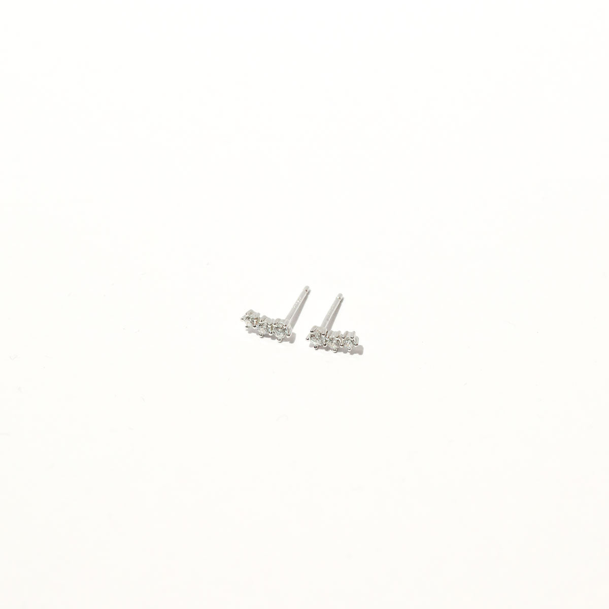 Glimmer Crystal Climber Stud Earrings in Silver flat lay
