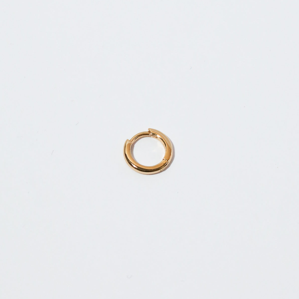 Essential 8mm Hoop in Gold flat lay