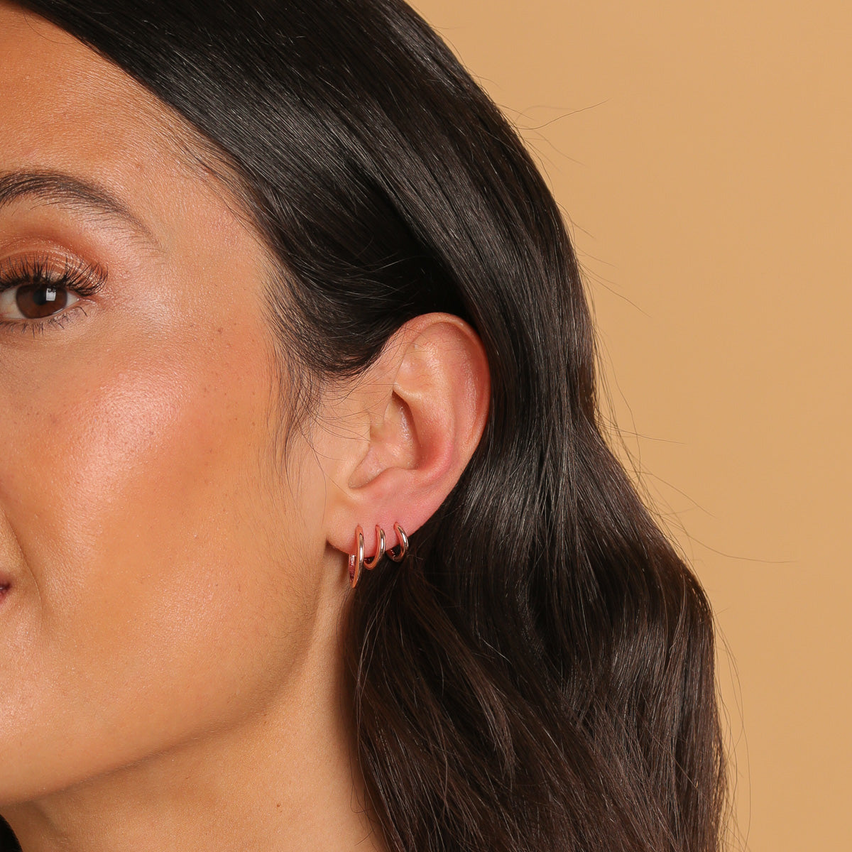 Essential 8mm Hoop in Rose Gold worn with all sizes