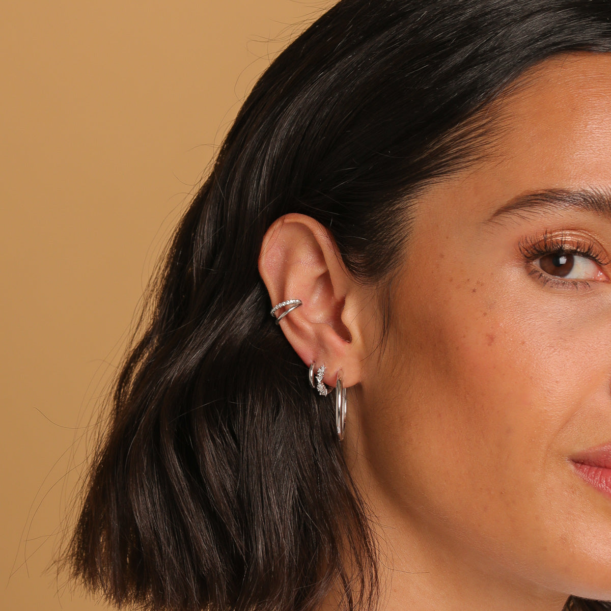 Essential 8mm Hoop in Silver in upper lobe piercing