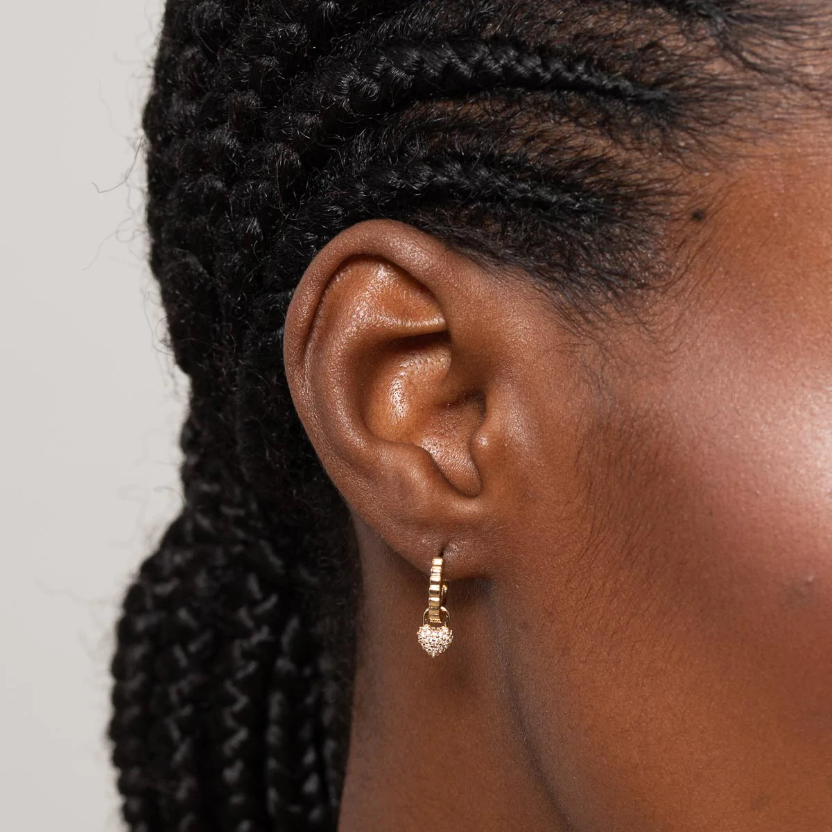 Heart Pave Charm Huggies in Gold worn