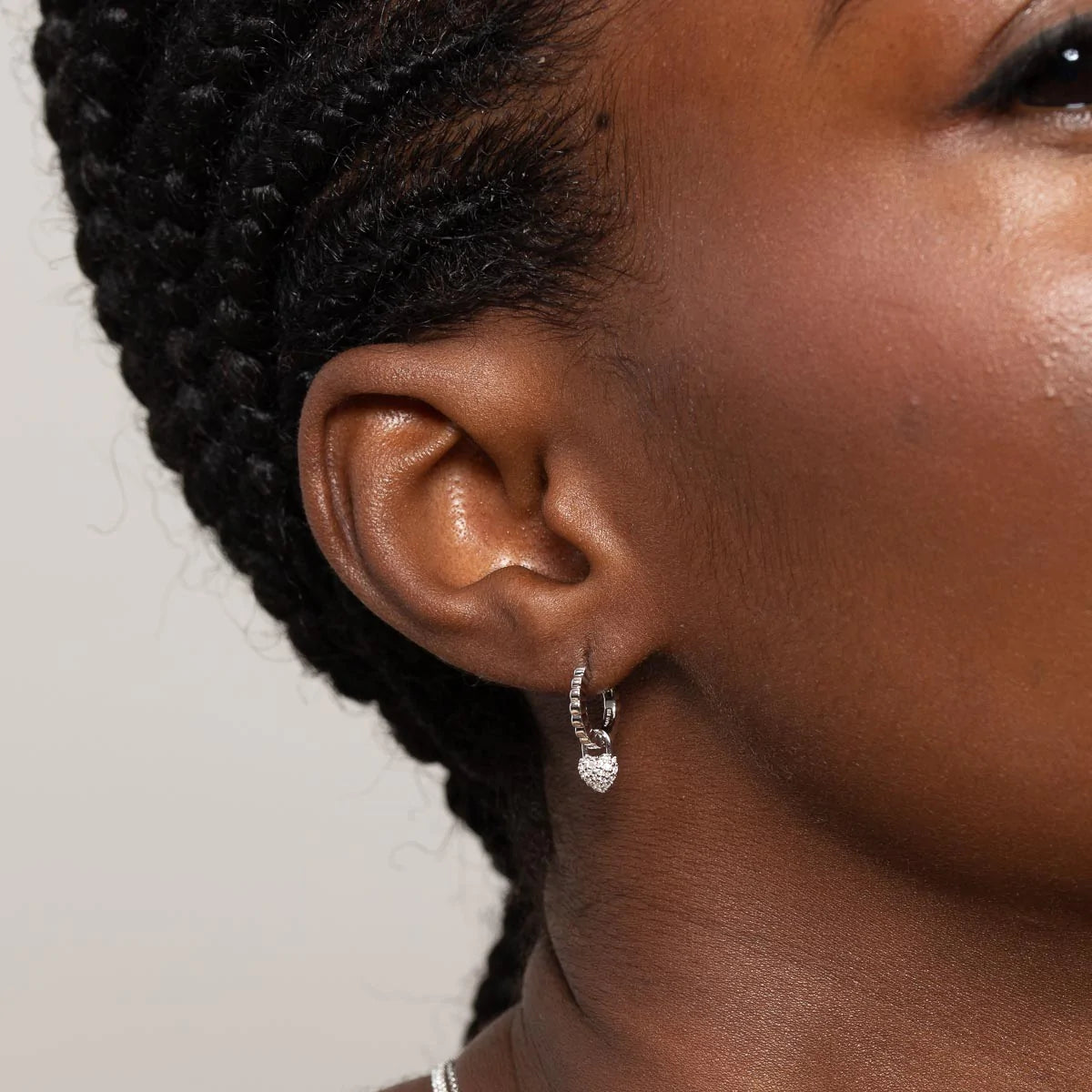 Heart Pave Charm Huggies in Silver worn