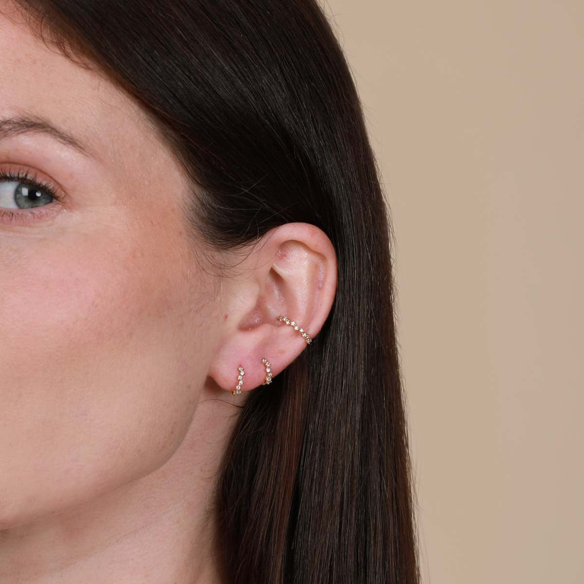 Worn shot of Cluster Hoop 11.5mm in Gold in conch piercing