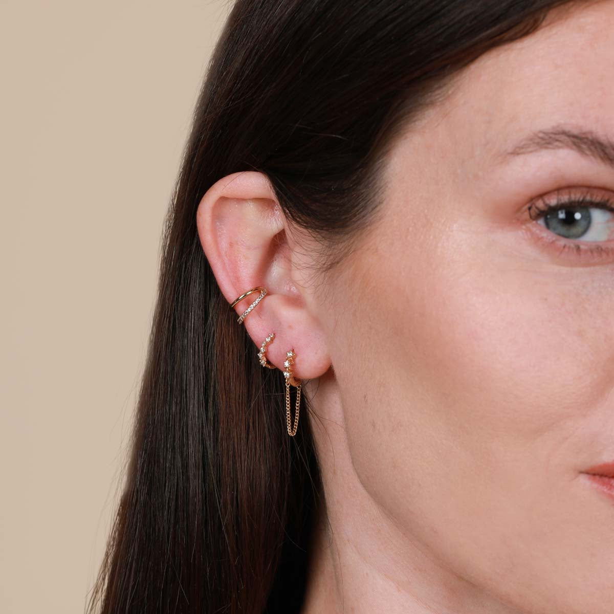 Worn shot of Cluster Hoop 8mm in Gold in upper lobe