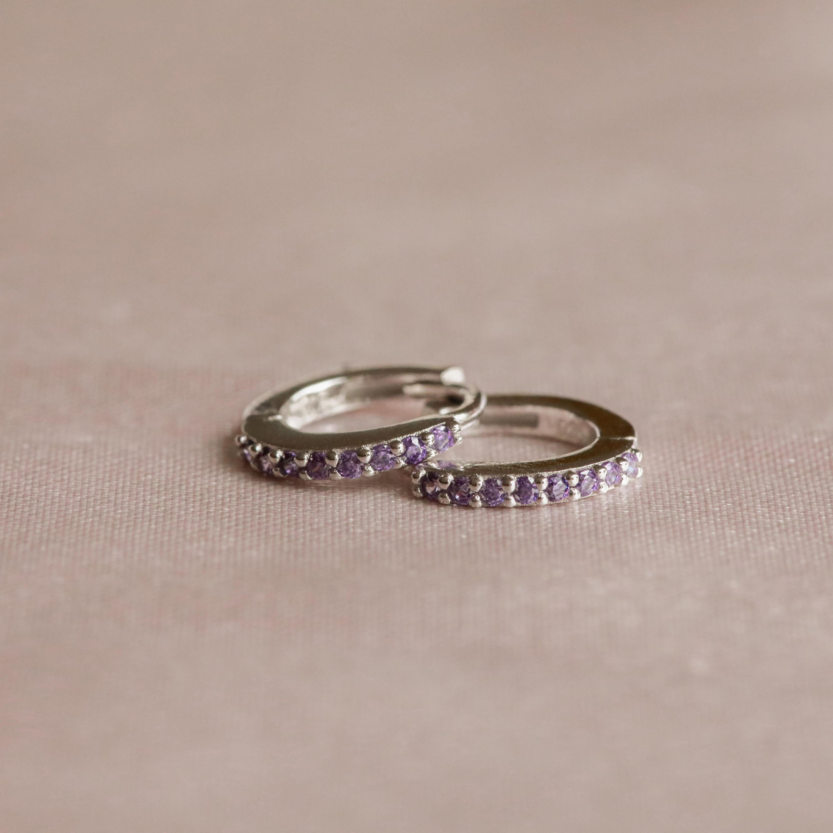 February Birthstone Huggies in Silver with Amethyst CZ