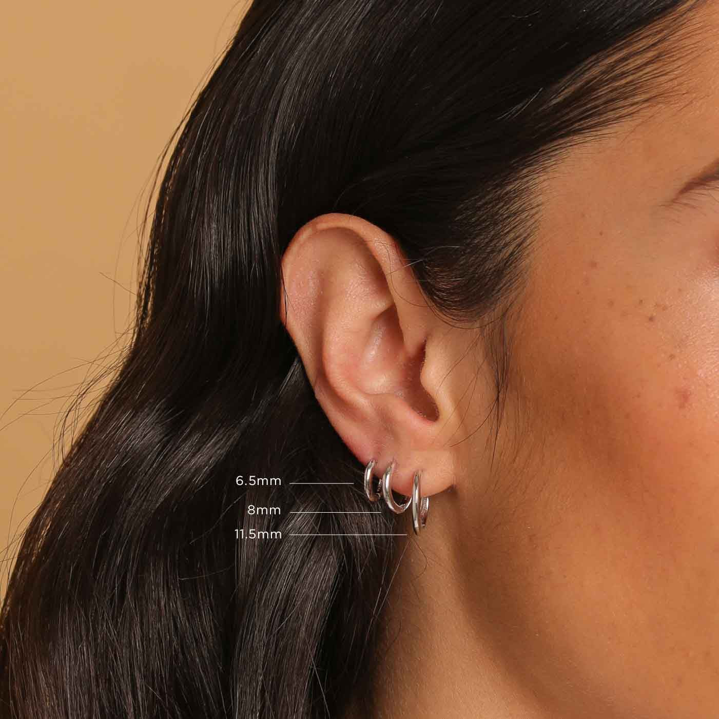 Essential 6.5mm Hoop in Silver worn with other sizes