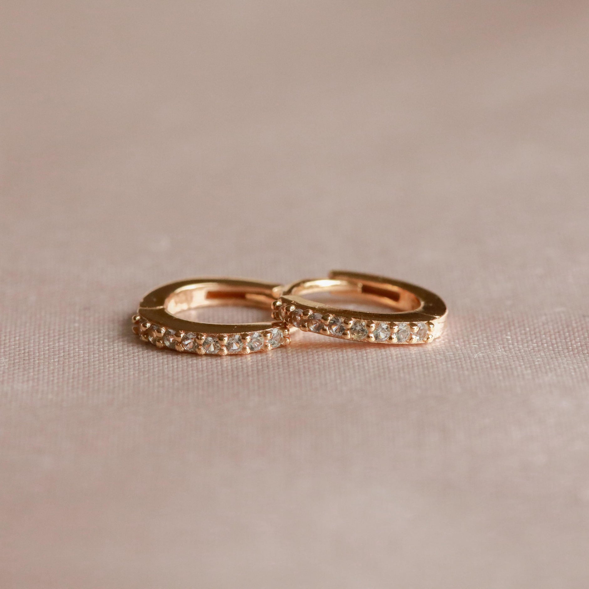 March Birthstone Huggies in Gold with Aquamarine CZ