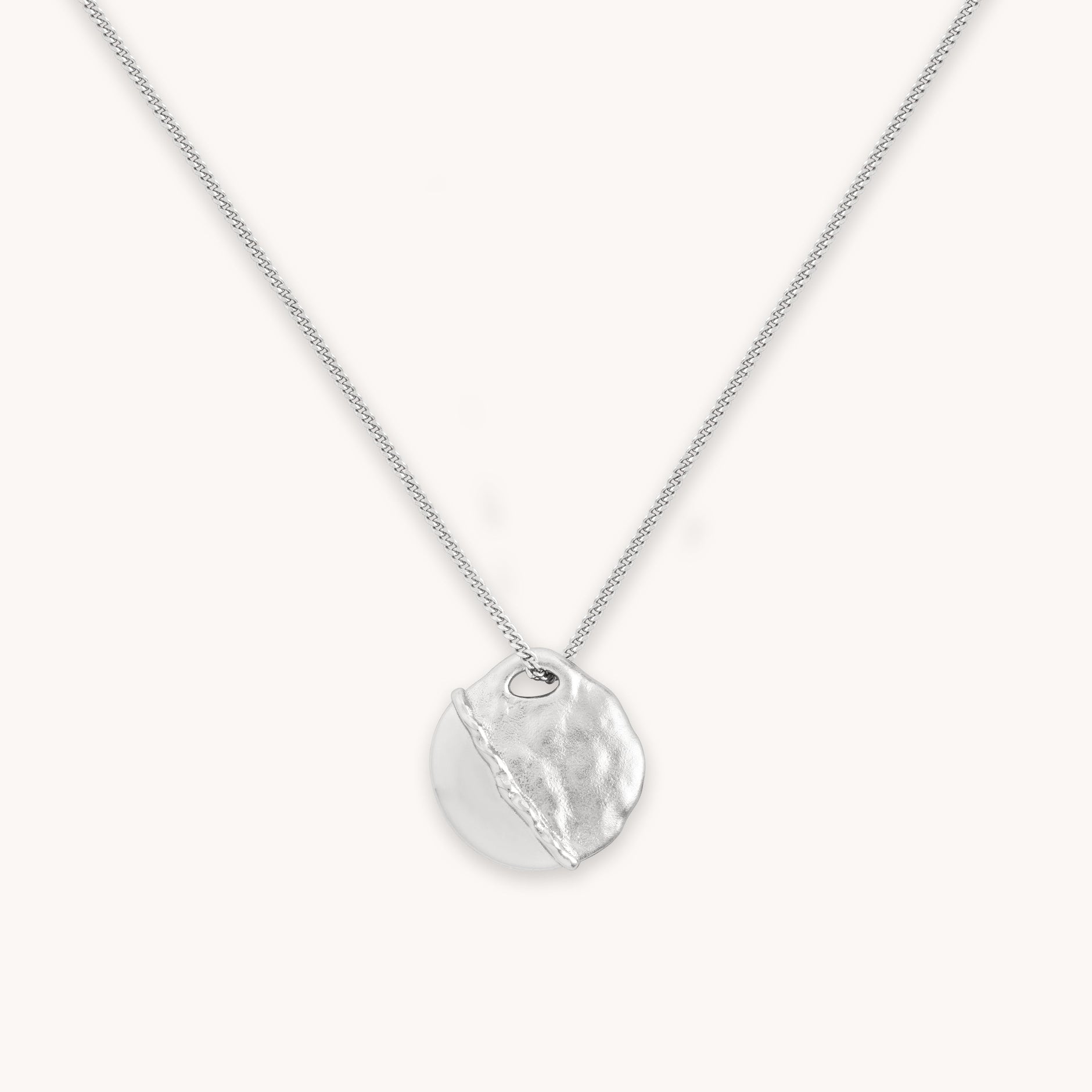 Molten Coin Pendant Necklace in Silver close up shot
