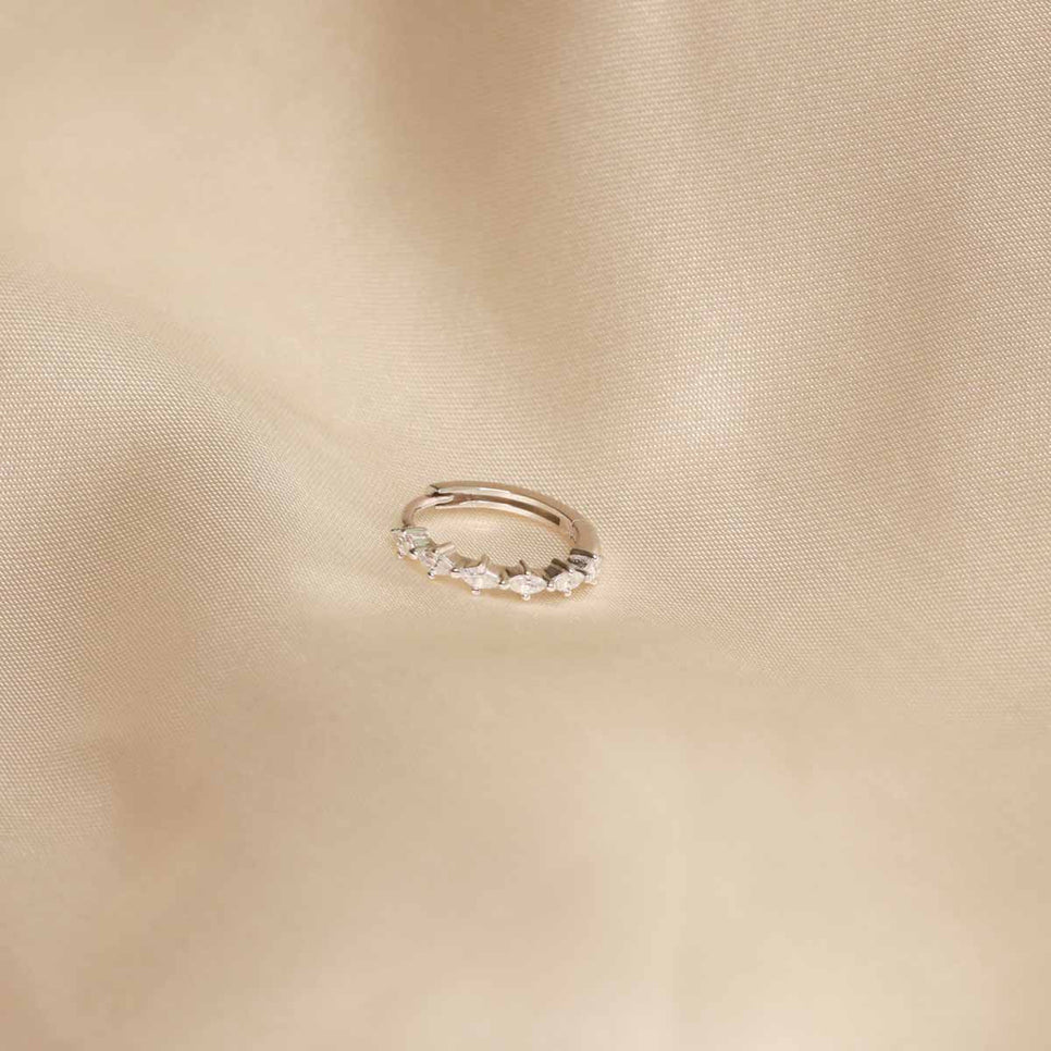 Flay lay shot of Navette Hoop 11.5mm in Silver