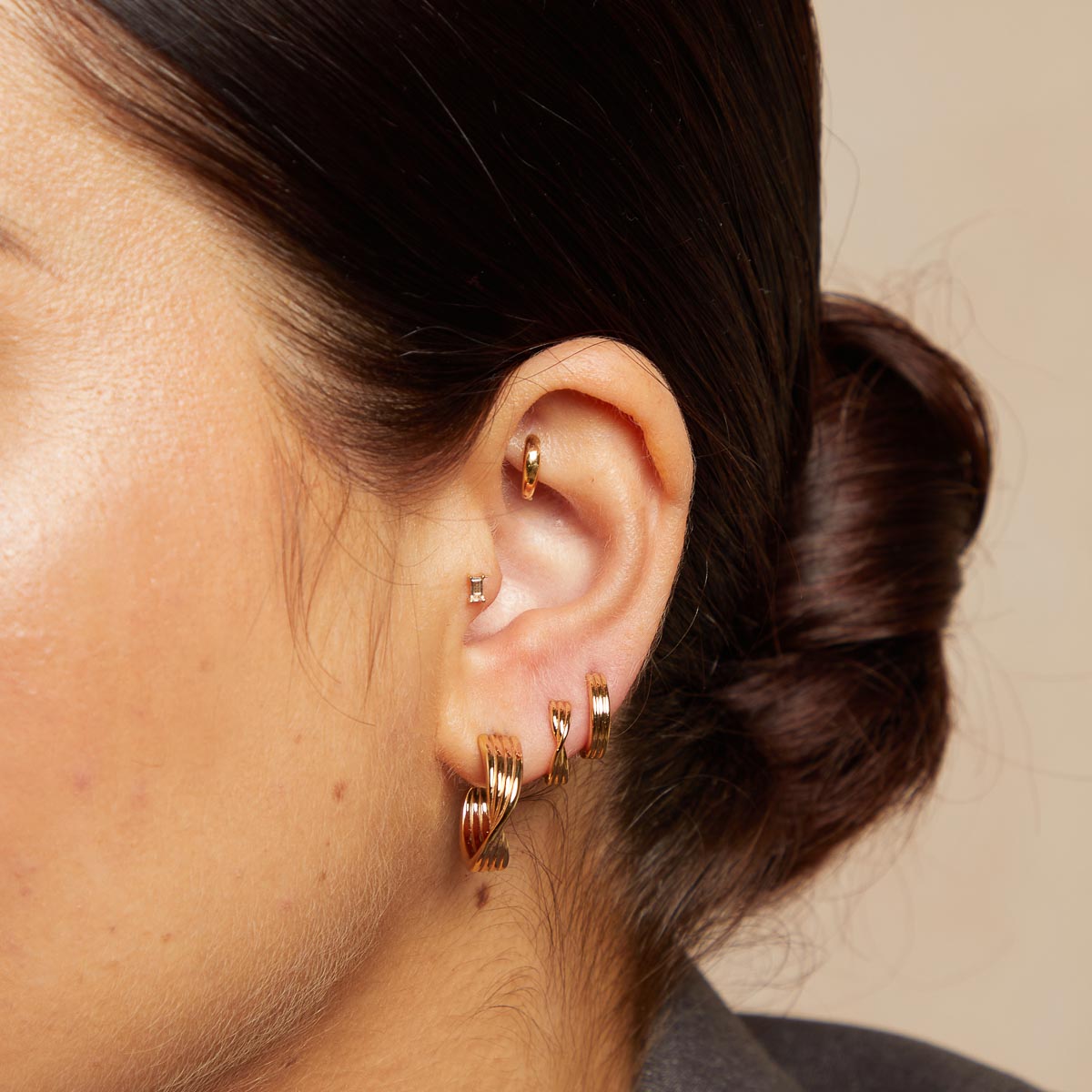Twist Hoops in Gold