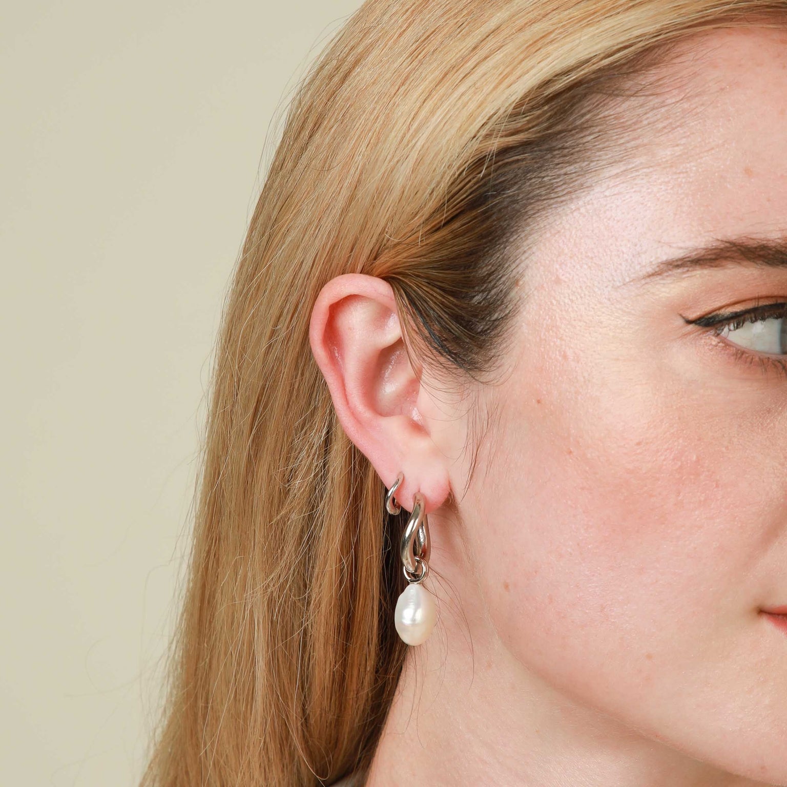 Pearl Charm Hoops in Silver worn
