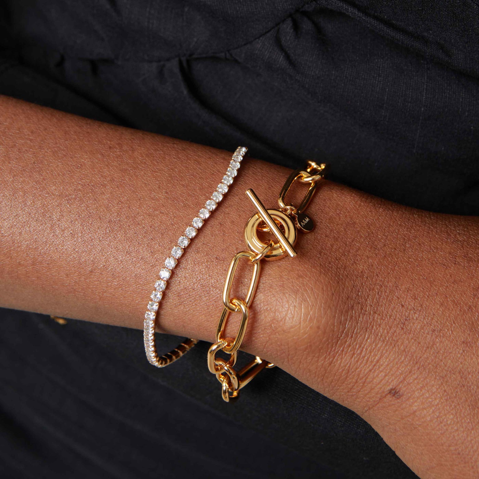 Bold Tennis Chain Bracelet in Gold flat lay shot worn