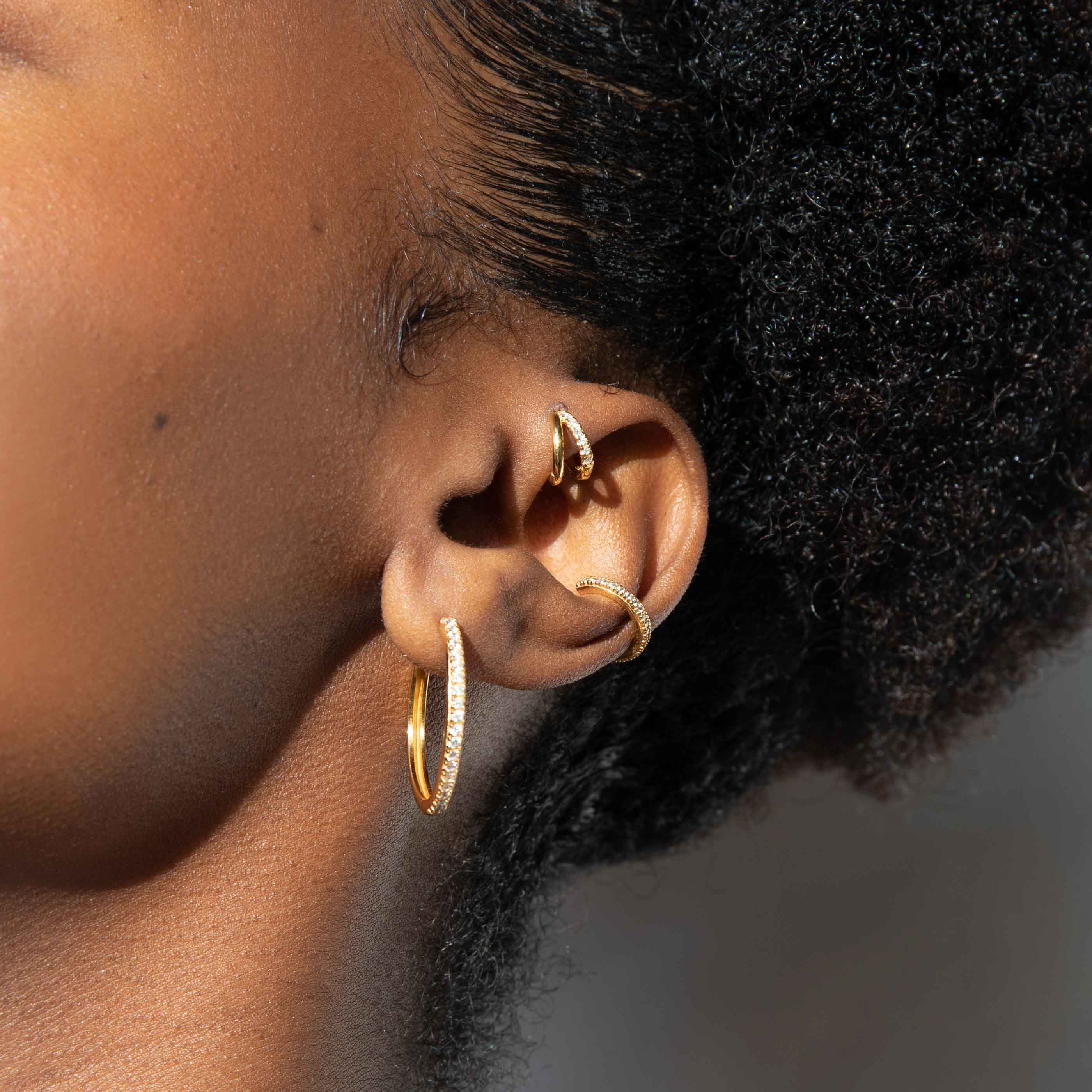 illusion crustal clicker worn in forward helix piercing