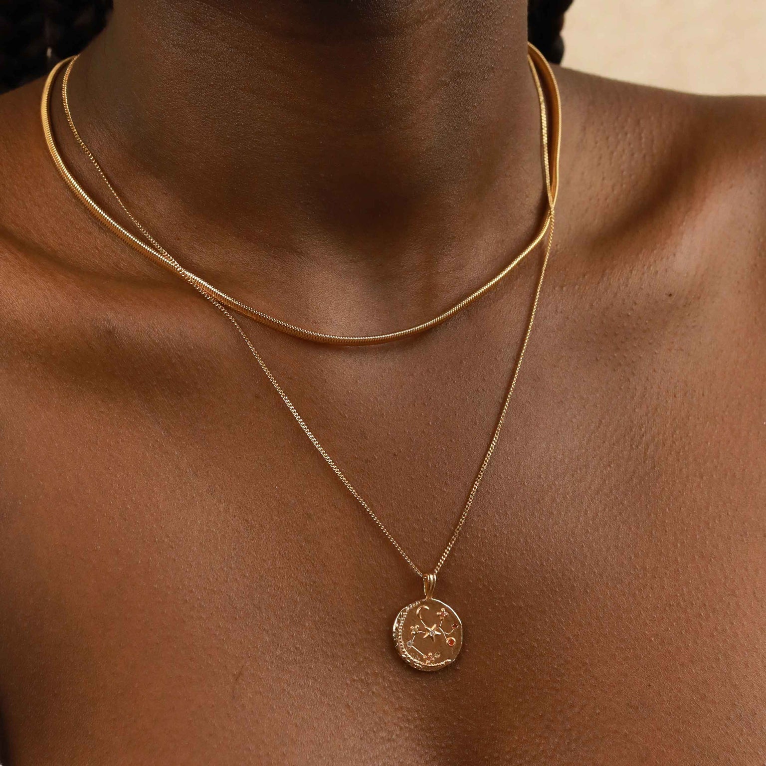 Oval Snake Chain Necklace in Gold layered with zodiac pendant necklace