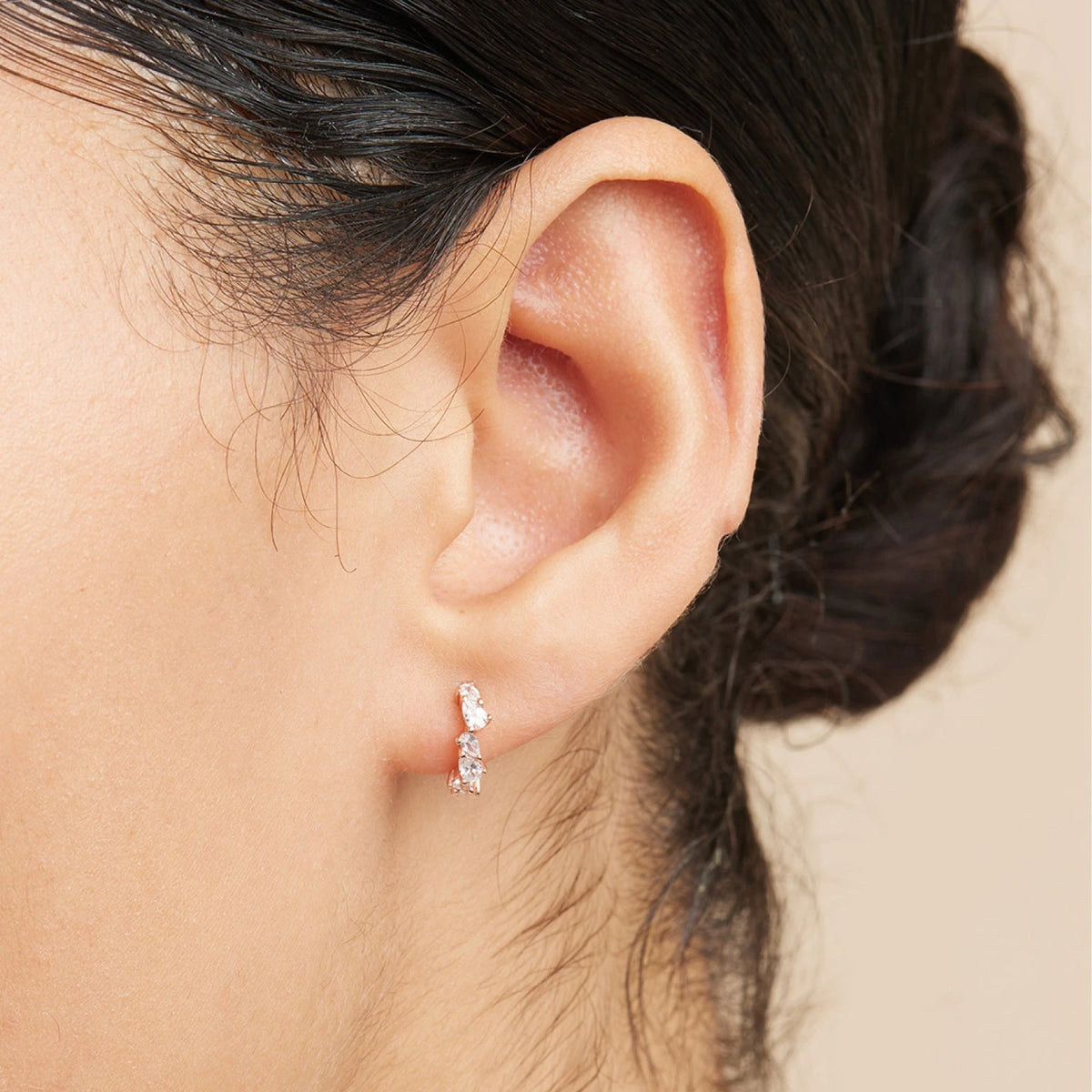 Rose gold huggie hoop earrings discount