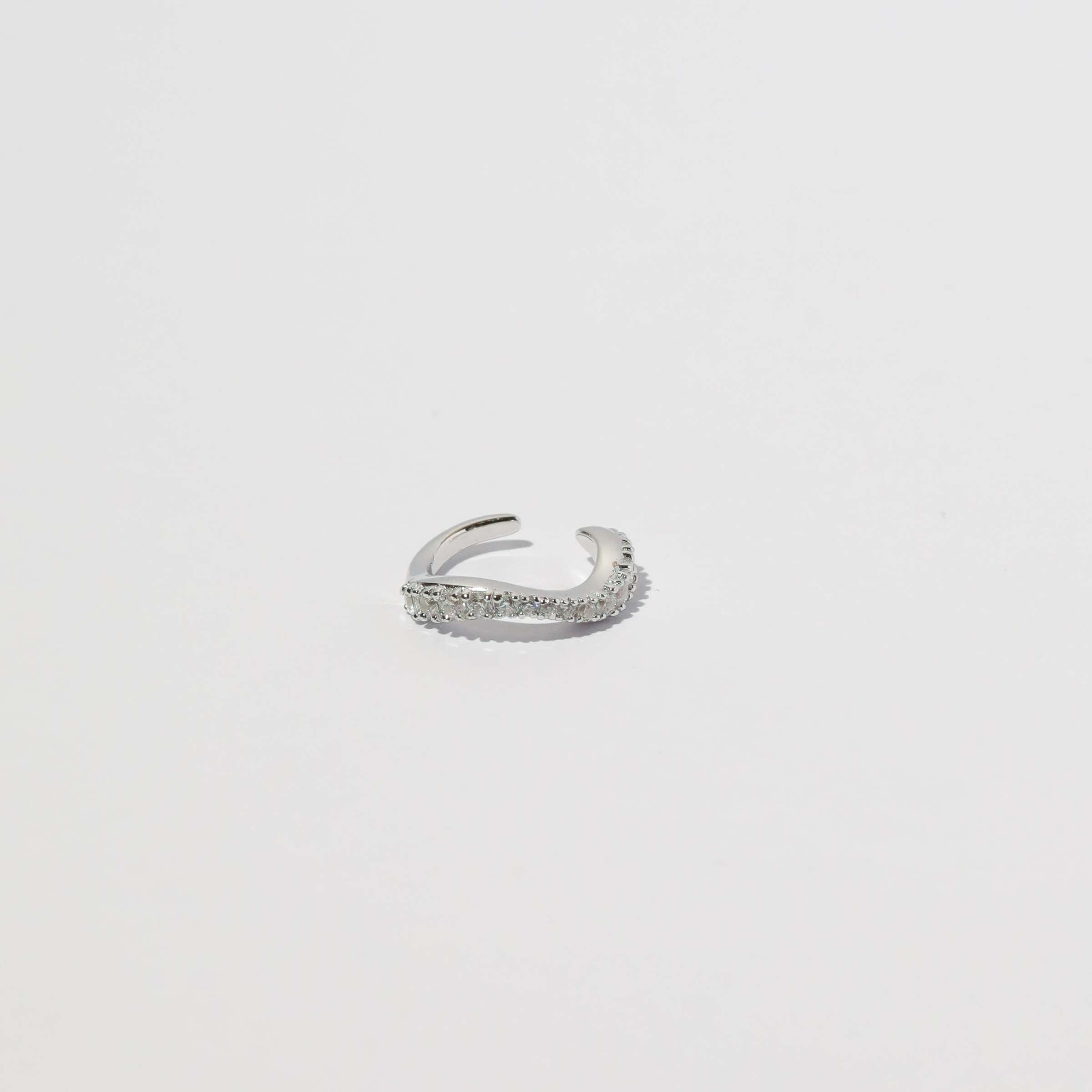 Wave Crystal Ear Cuff in Silver flat lay