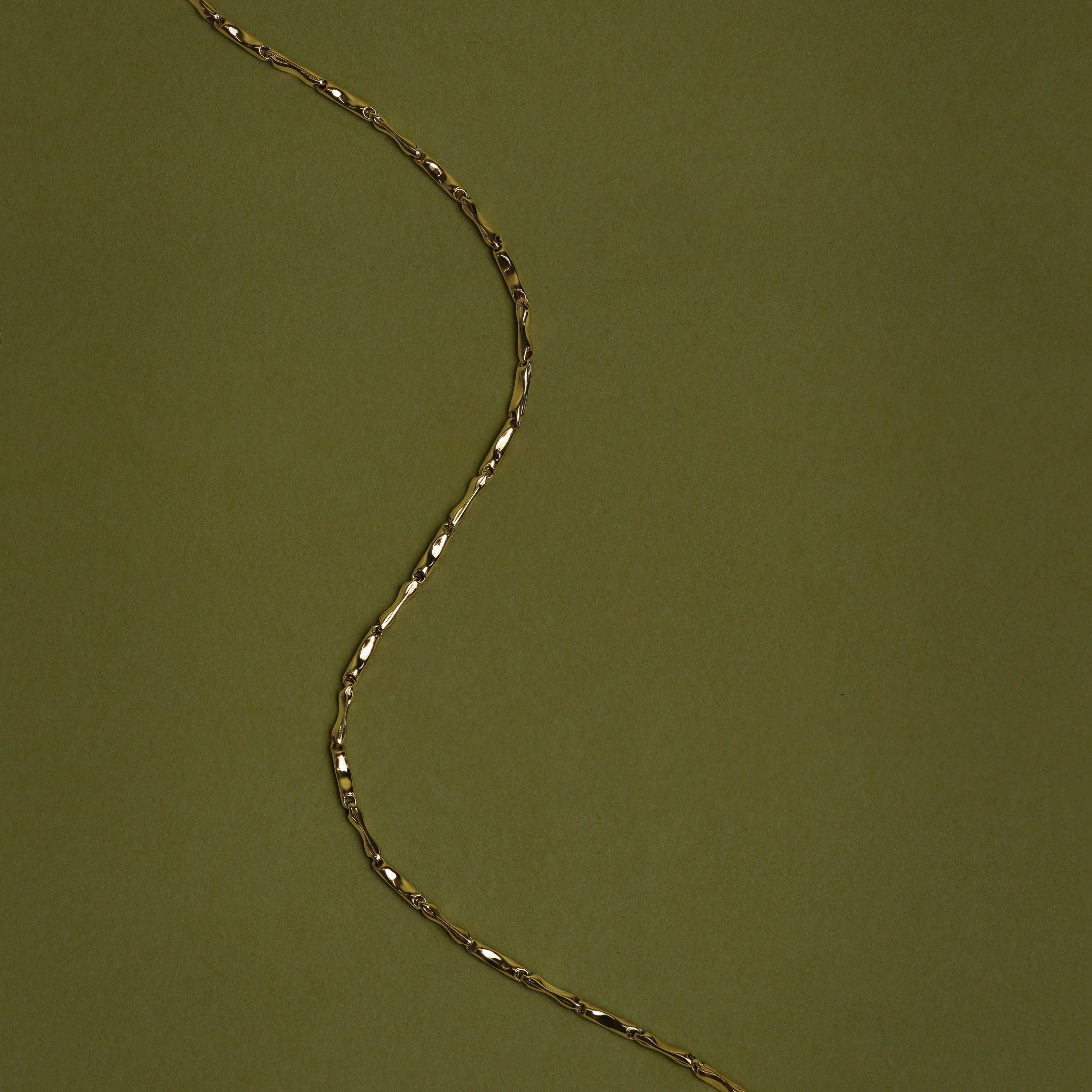 Molten Bar Chain Bracelet in Solid Gold
