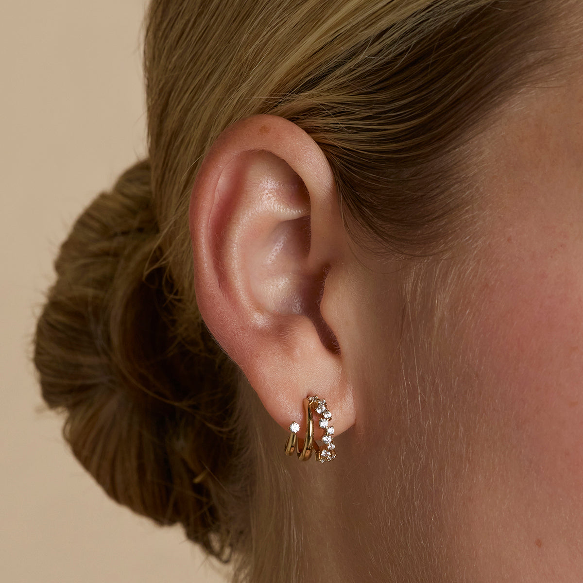 Illusion Spiral Huggies in Gold-Astrid &amp; Miyu