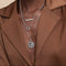 Scorpio Bold Zodiac Pendant Necklace in Silver worn layered with necklaces