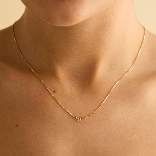 Bow Charm Necklace in 9k Gold