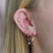 Simple Hinge Hoops in Rose Gold worn with hoops and clickers