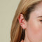 Wave Crystal Ear Cuff in Gold layered with Wave Crystal Ear Cuff with Wave Huggies