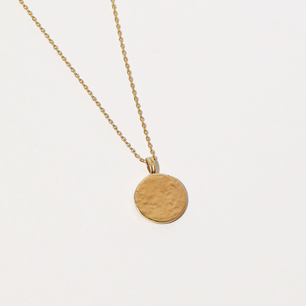 Close up shot of the back of the Aquarius Zodiac Pendant Necklace in Gold