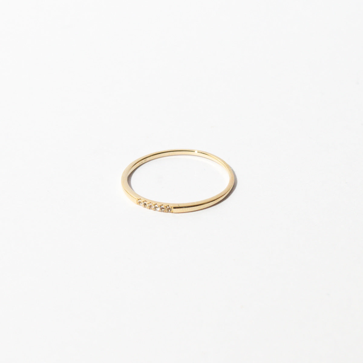 Topaz Band Ring in Solid Gold Flat Lay