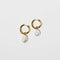 Serenity Pearl Charm Hoops in Gold flat lay