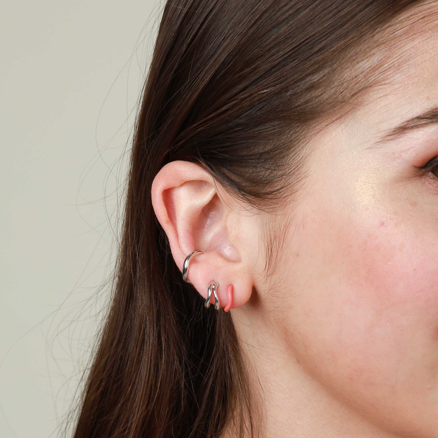 Wave Ear Cuff in Silver worn with Duo Molten Hoops and Wave Coral Enamel Huggie