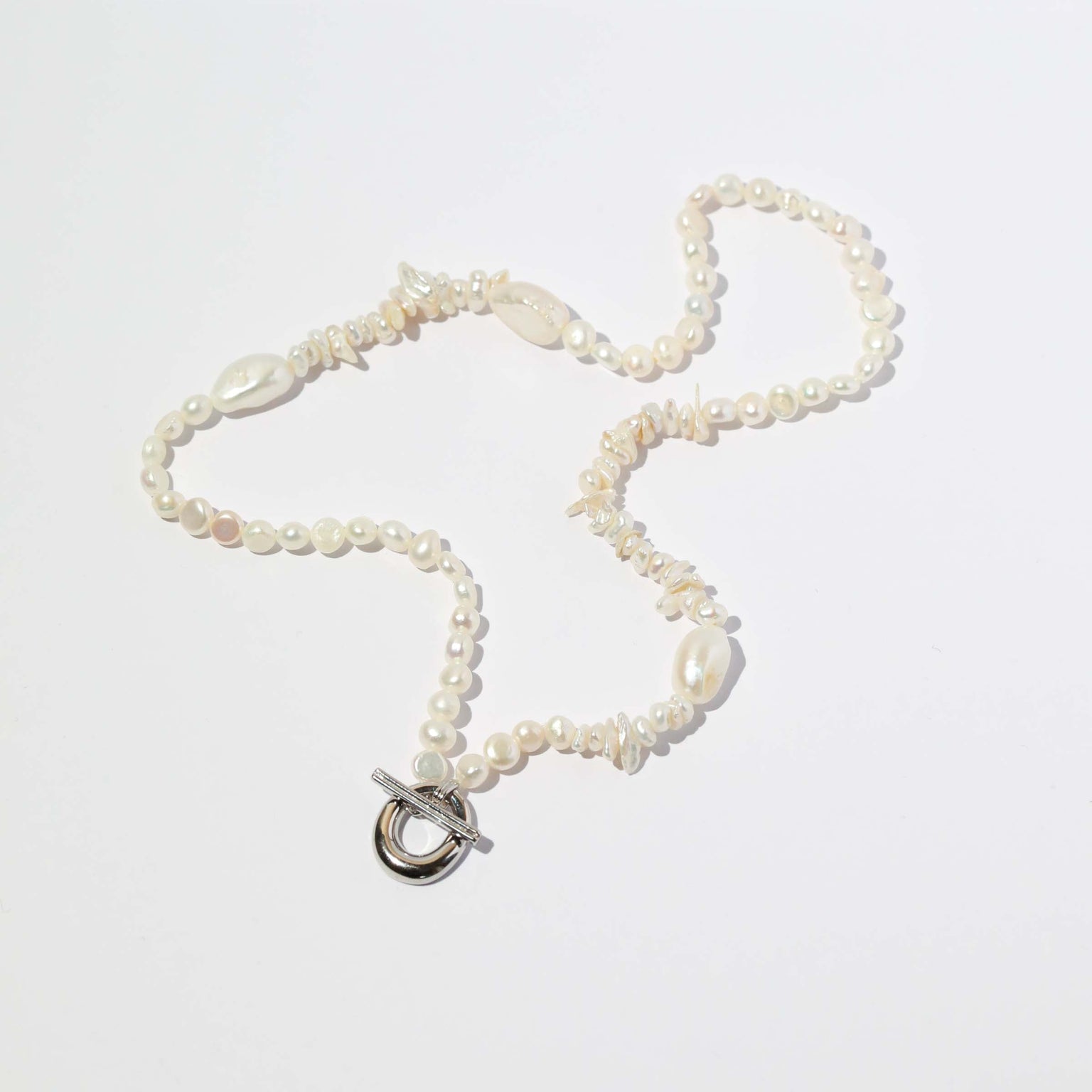 Serenity Pearl Beaded T-Bar Necklace in Silver flat lay