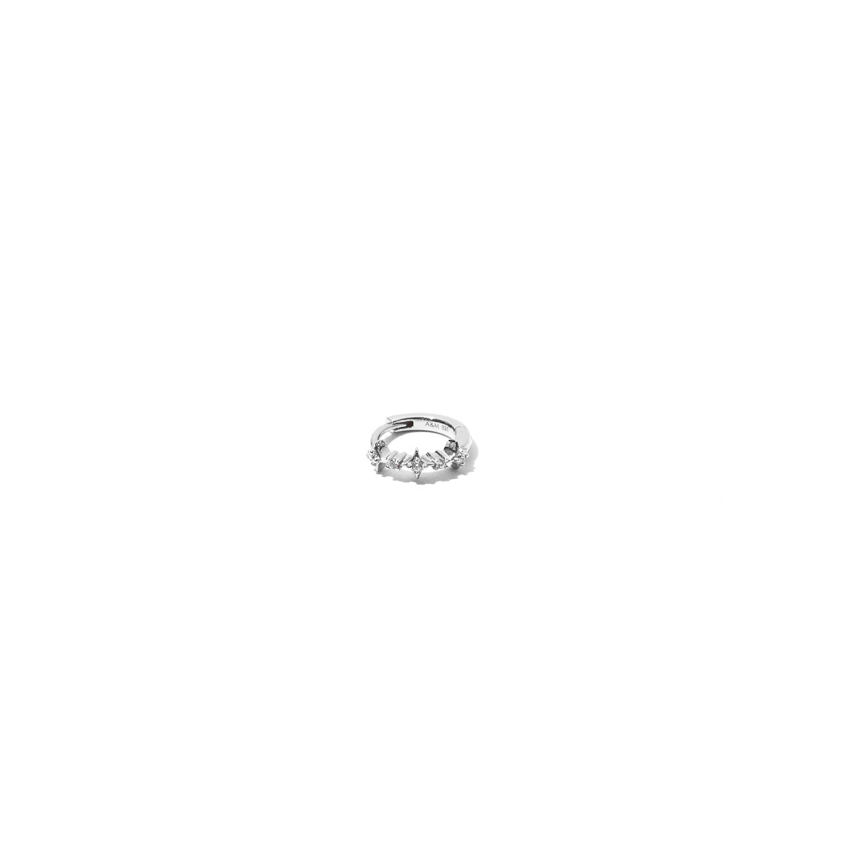 Cosmic Star 6.5mm Hoop in Silver flat lay