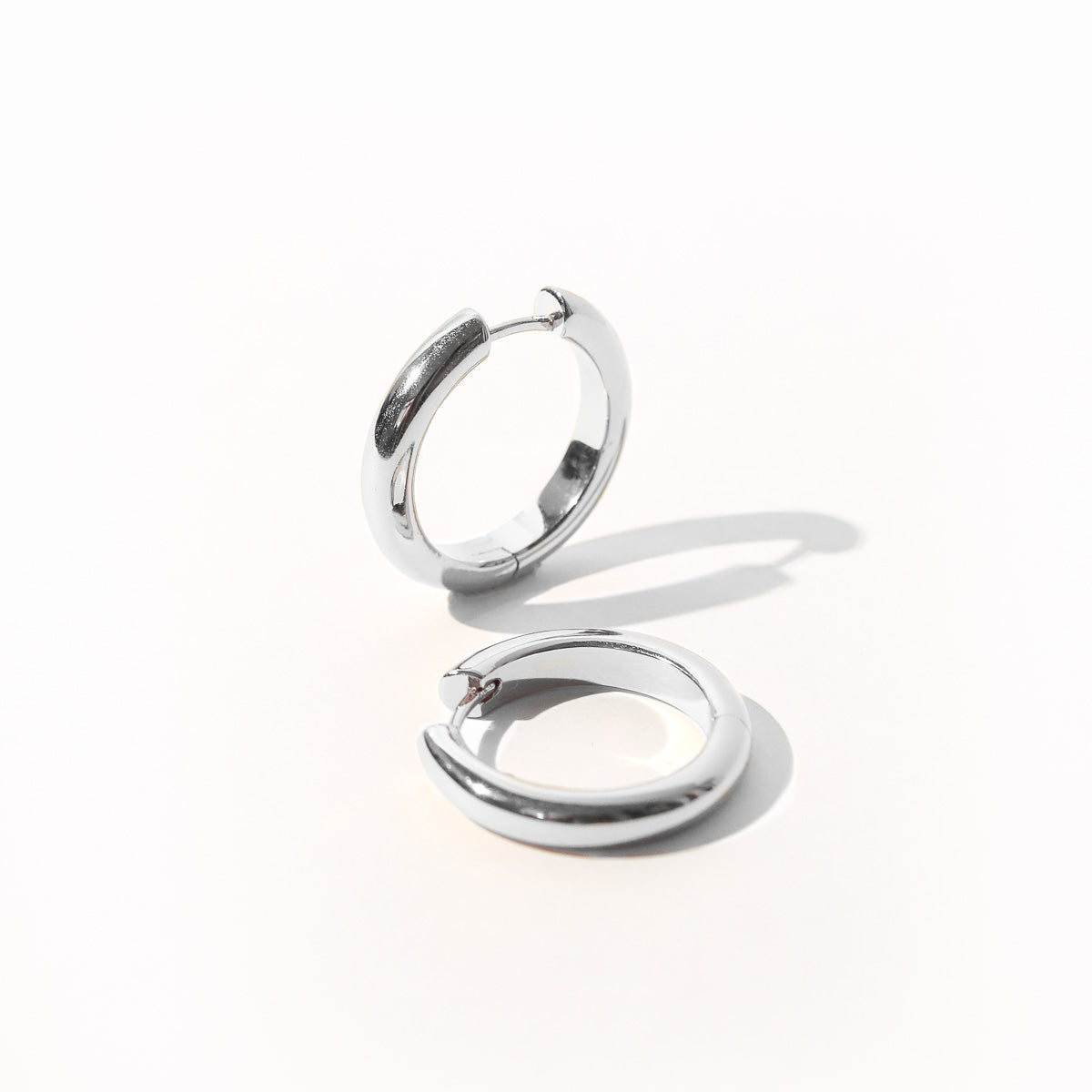 Bold Large Hoops in Silver flat lay shot