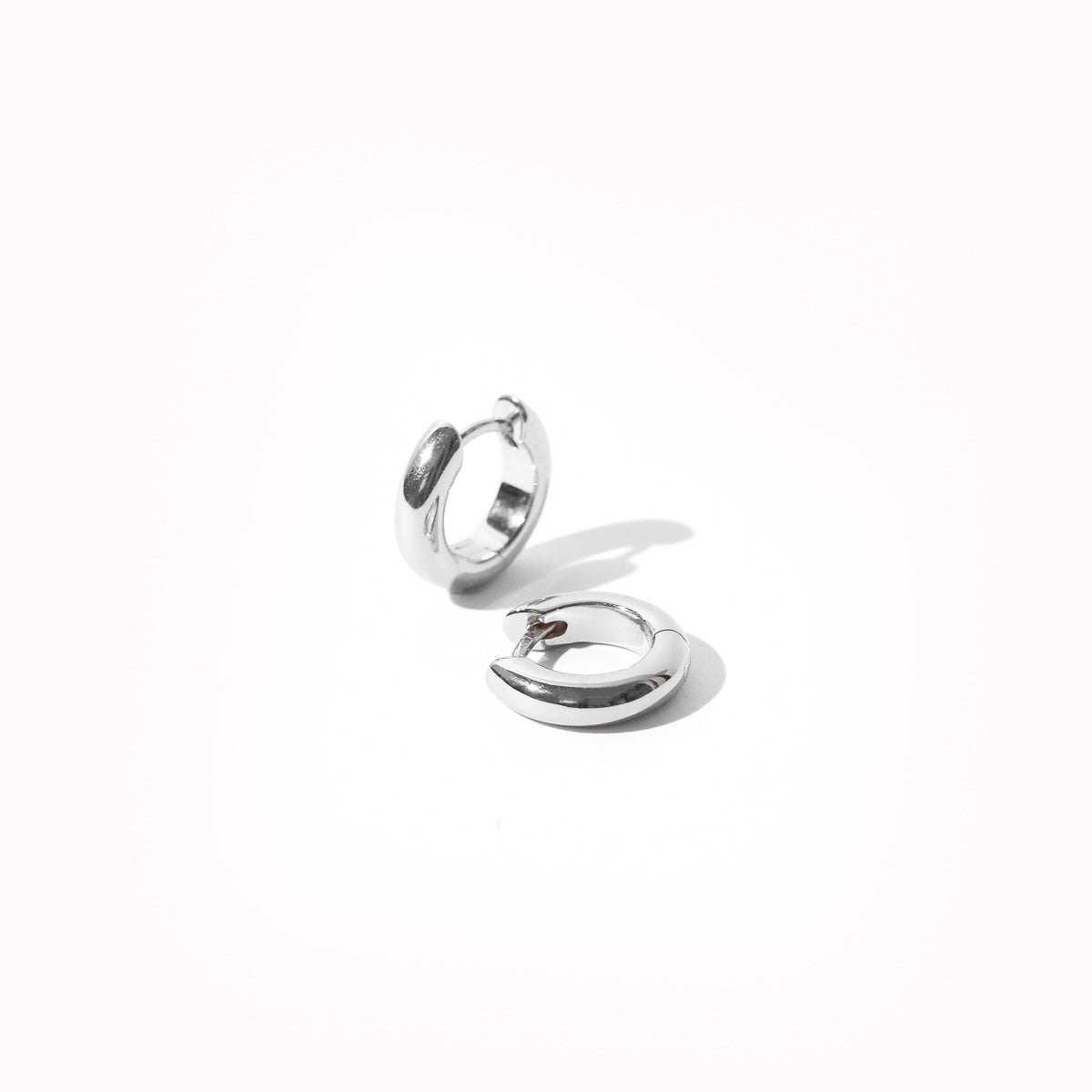 Bold Small Hoops in Silver flat lay image
