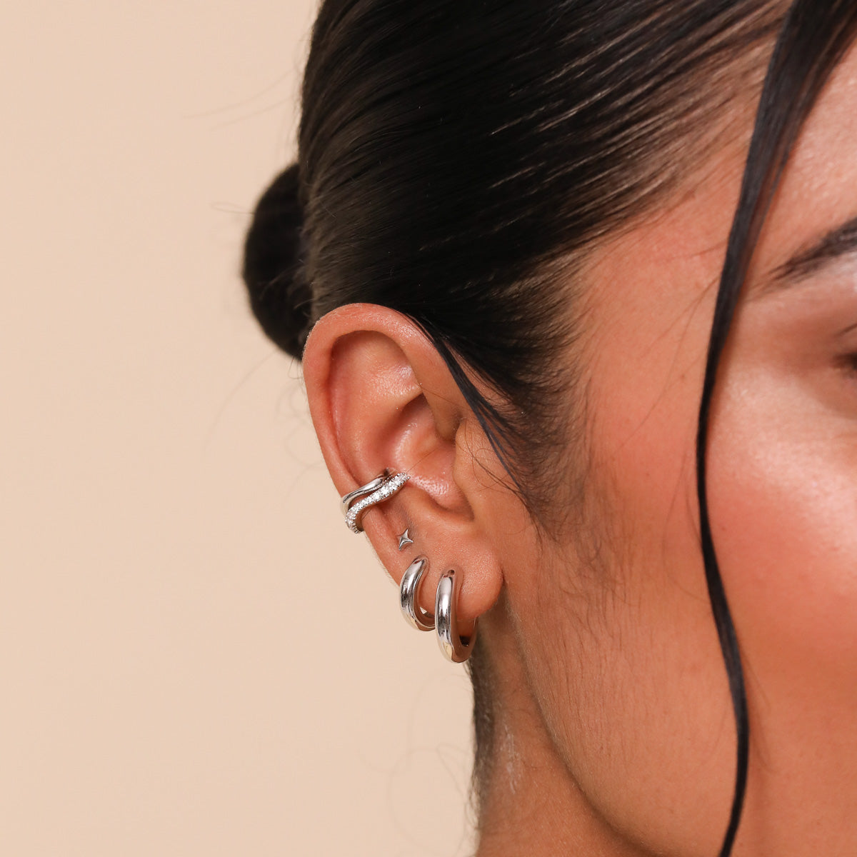 Bold Small Hoops in Silver worn