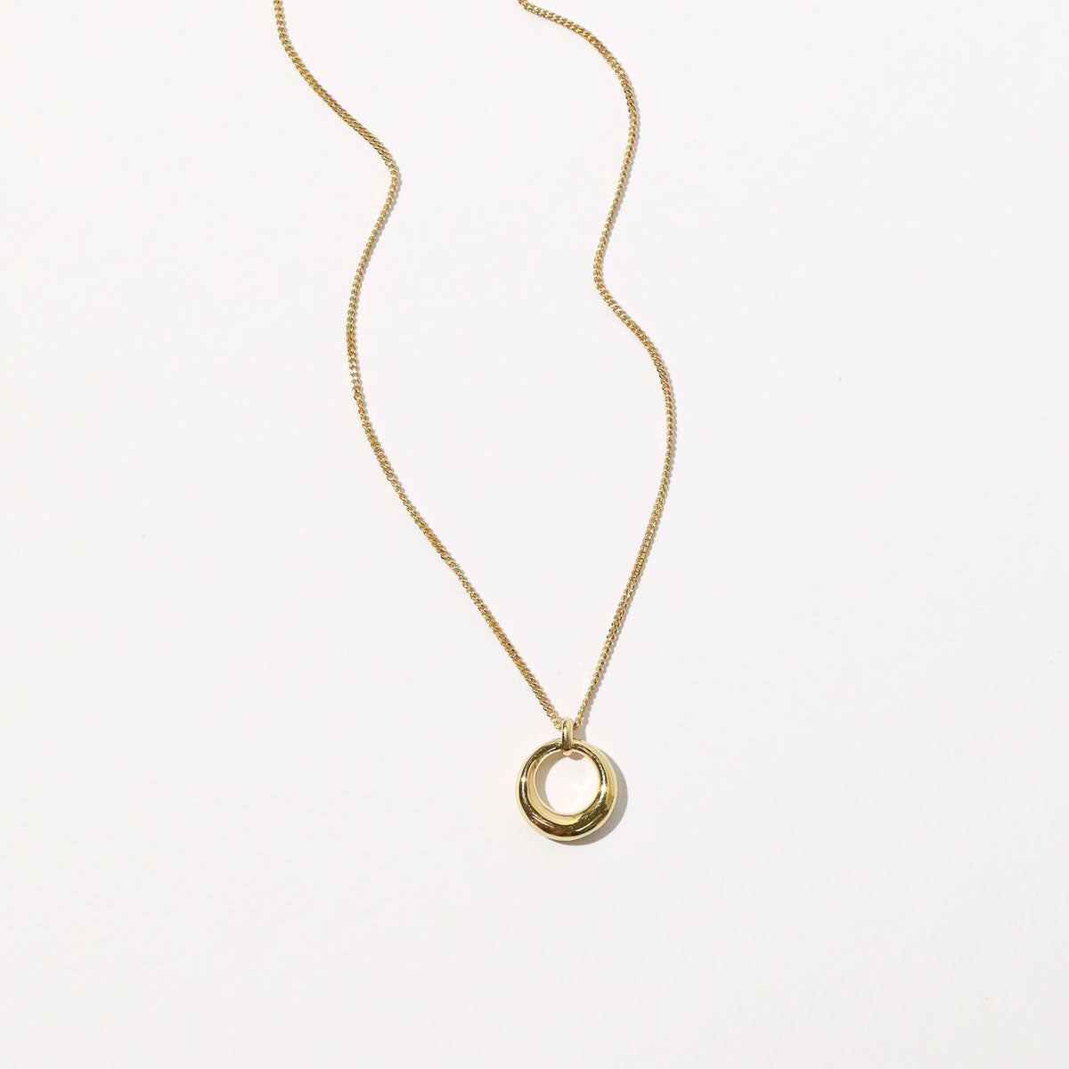 Bold Halo Pendant Necklace in Gold flat lay