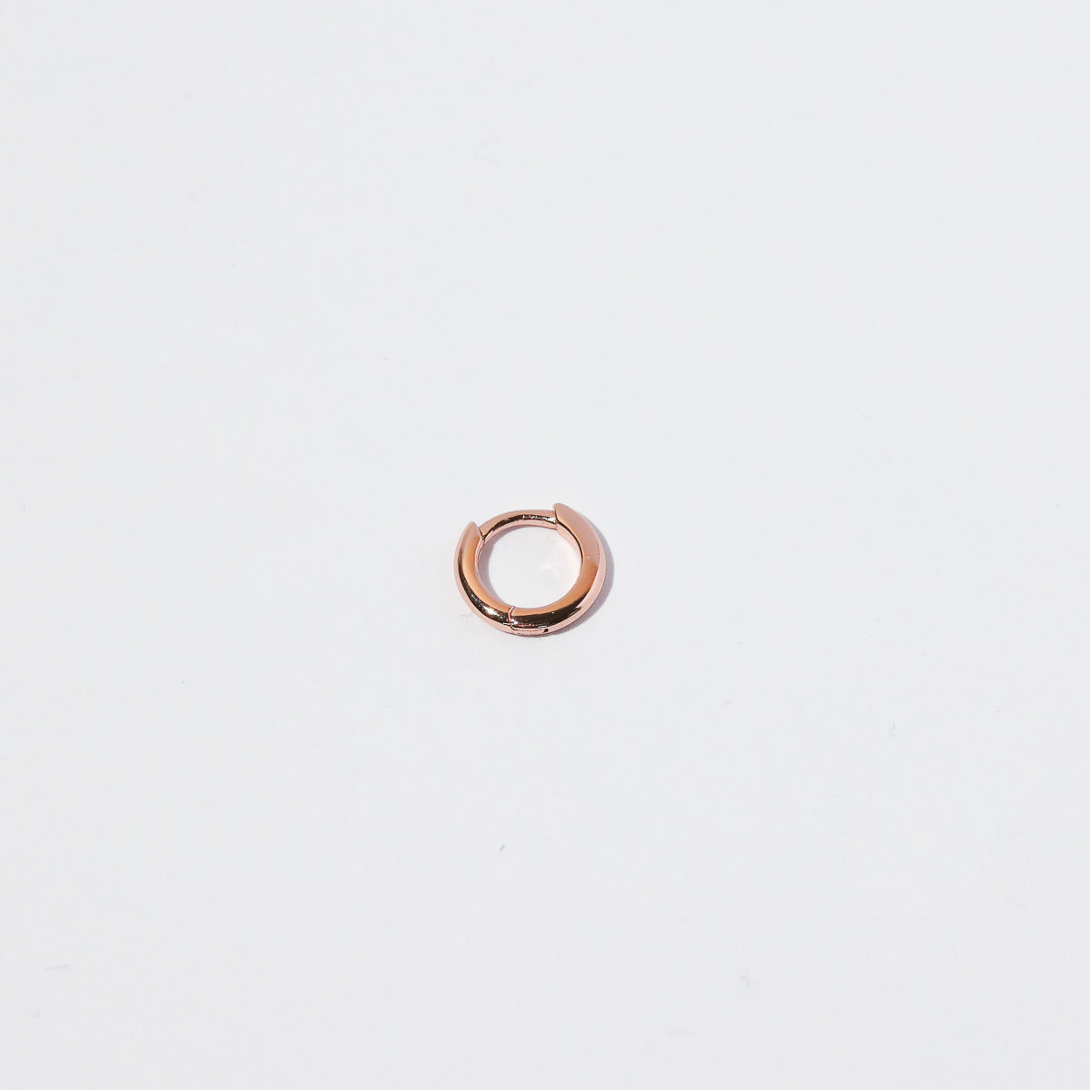 Essential 6.5mm Hoop in Rose Gold flat lay