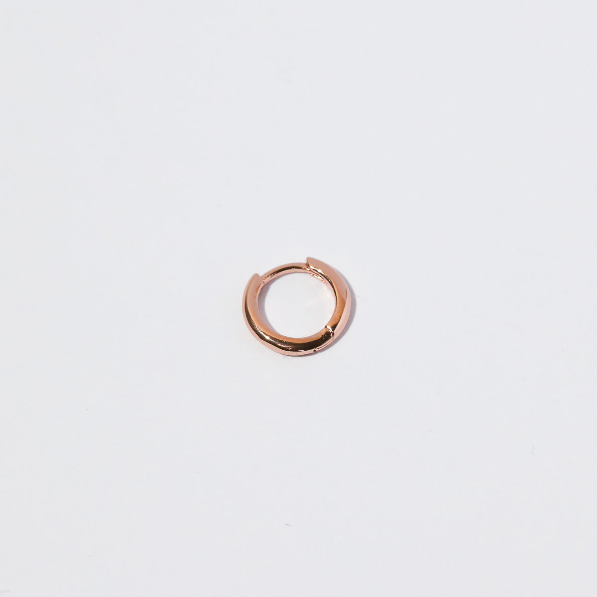 Essential 8mm Hoop in Rose Gold flat lay