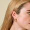Molten Wave Small Hoops in Gold worn