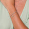 Cosmic Star Opal Bracelet in Silver worn with Tennis Bracelet in Silver